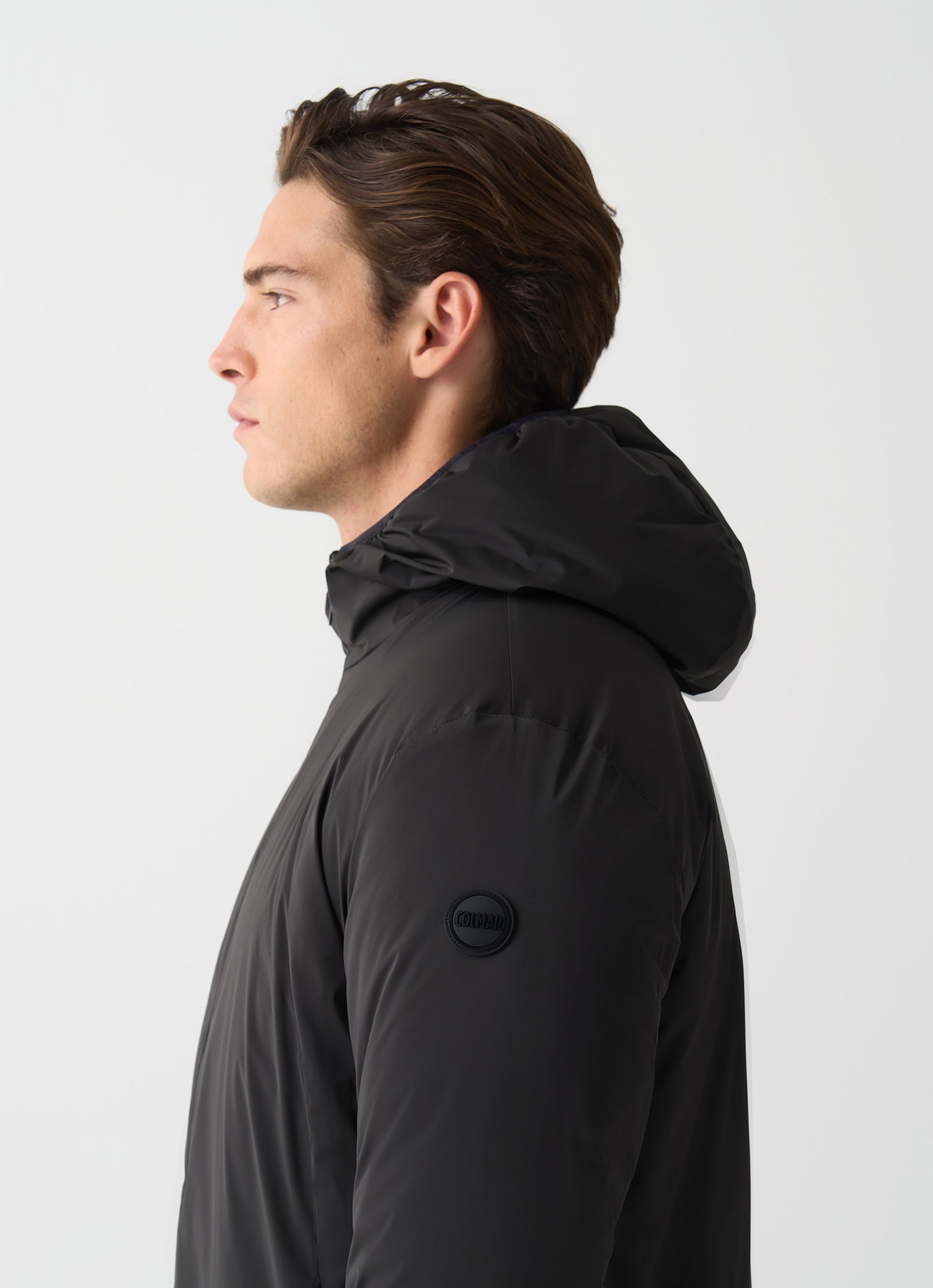 Colmar Giacca lunga uomo stretch nera autunnale con cappuccio fisso