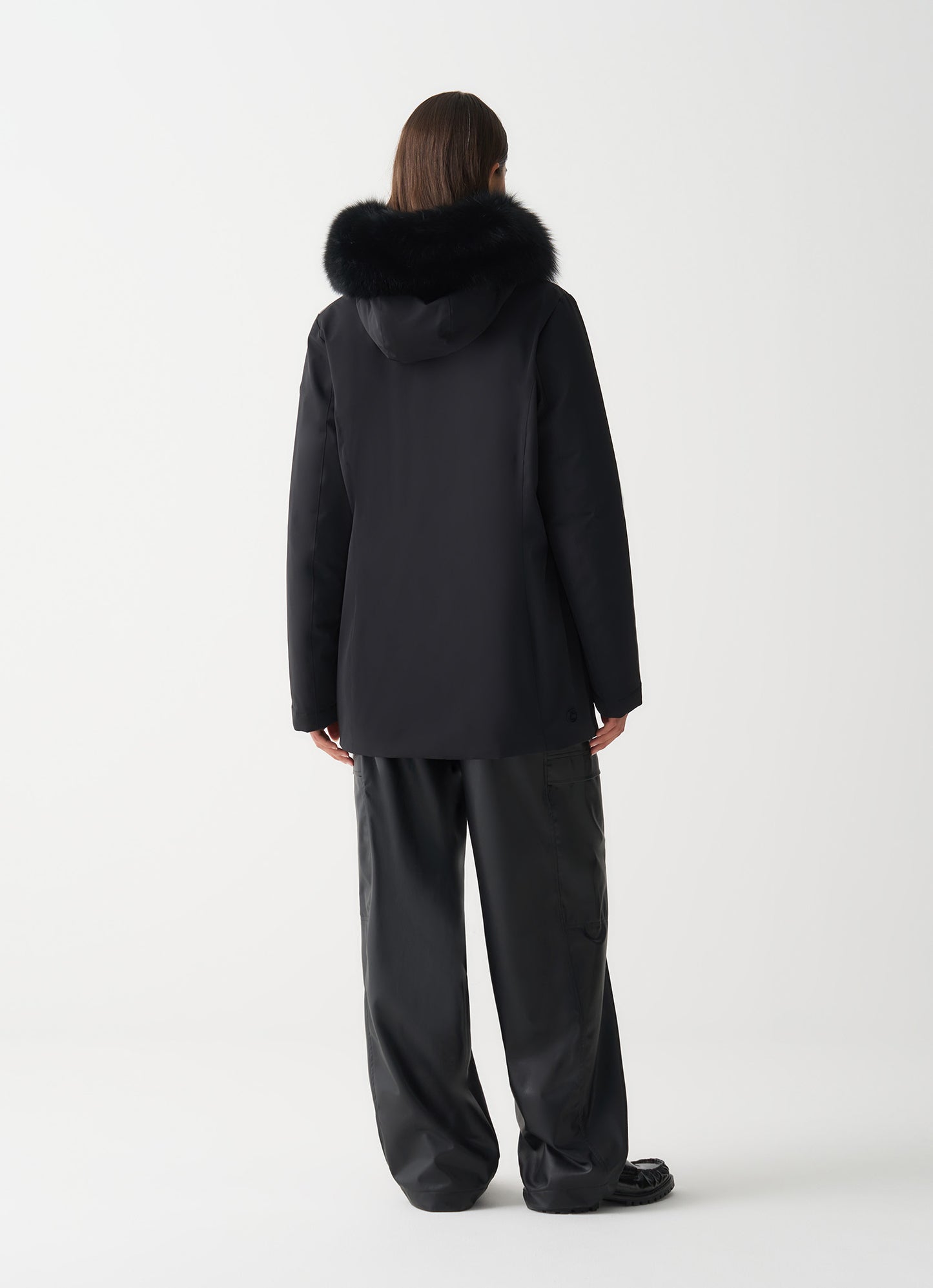 Piumino donna Colmar nero impermeabile con cappuccio e pelliccia sintetica staccabile vista dietro
