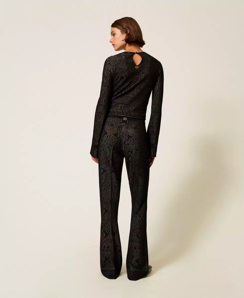 Twinset Pantaloni dpnna flare in maglia traforata
