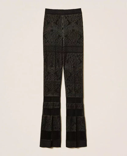 Twinset Pantaloni dpnna flare in maglia traforata