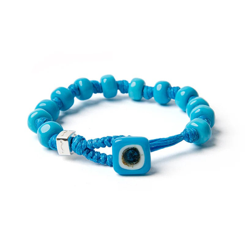 Braccialetto Aua Cielo unisex in vetro azzurro con cordoncino cerato e dado in argento 925