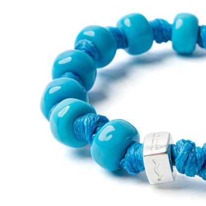 Braccialetto Aua Cielo unisex in vetro azzurro con cordoncino cerato e dado in argento 925 dettaglio
