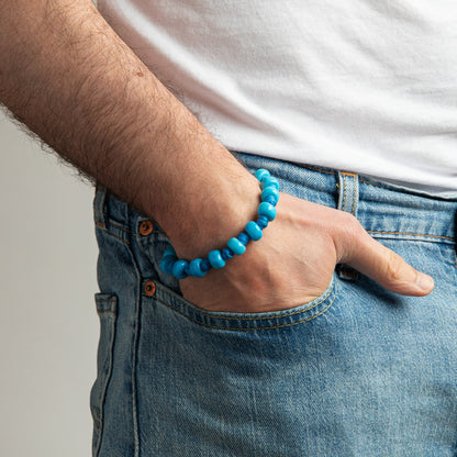Braccialetto Aua Cielo unisex in vetro azzurro con cordoncino cerato e dado in argento 925 uomo